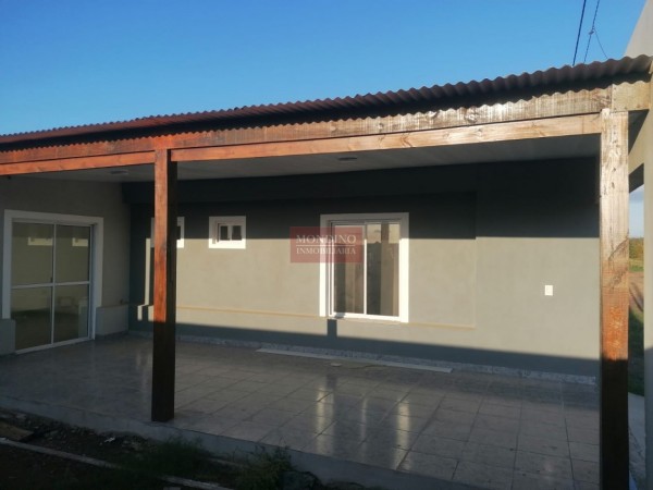 VENDO CASA A ESTRENAR MONTE MAIZ - 3 DORMITORIOS